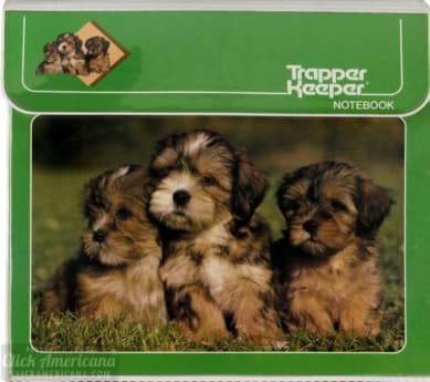 Trapper keeper with puppies on it